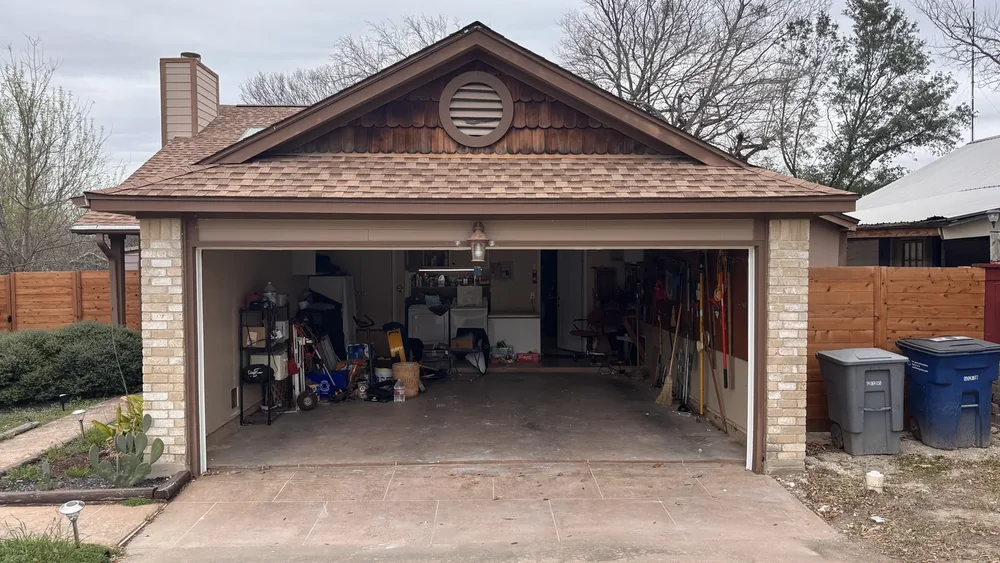 Wide garage door opening created after structural prep — Cedar Park TX